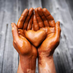 heart made of potter 39 s clay in the hands of a 2023 11 27 05 20 29 utc