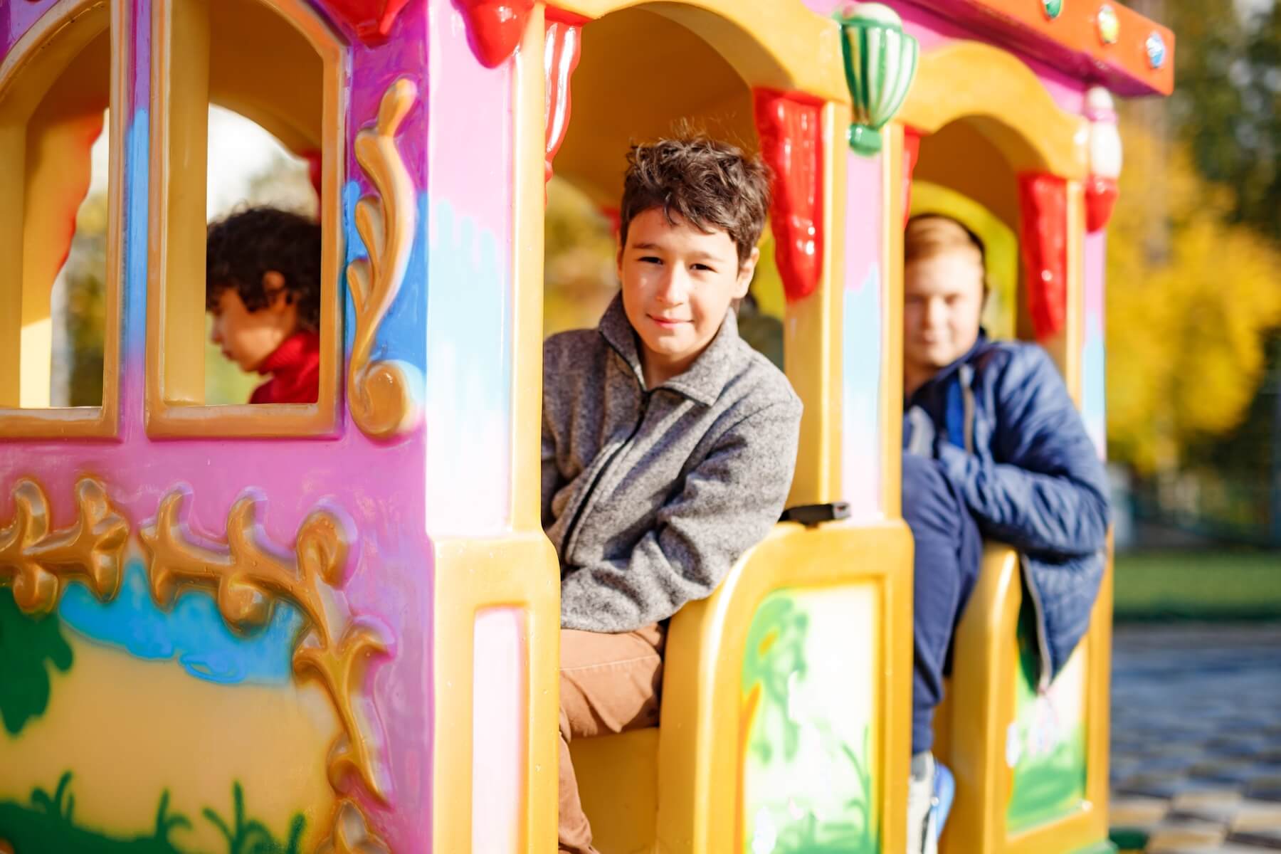 boys riding train on children playground in city p 2023 11 27 05 27 17 utc.jpg