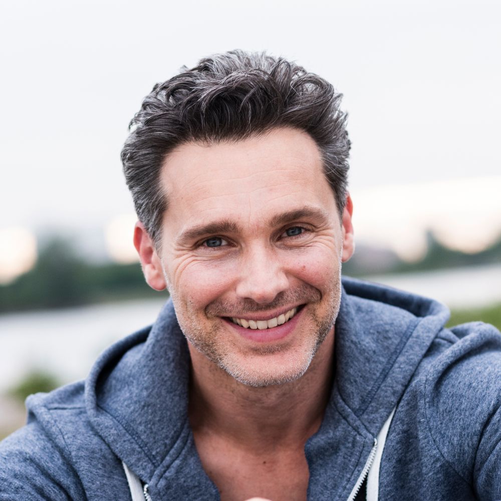 portrait of smiling man at the riverside b6w5ehb 1 2.jpg