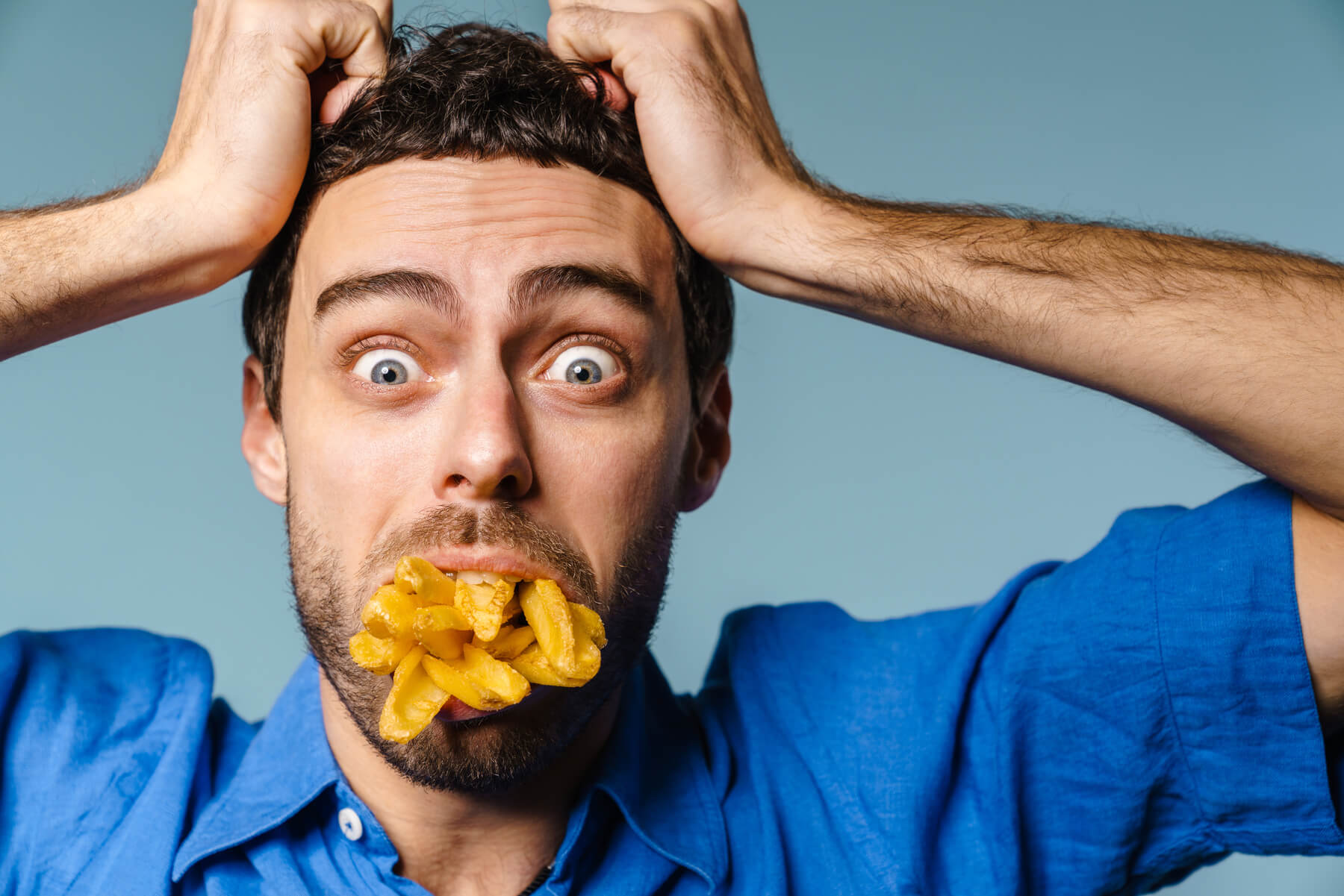 shocked guy grabbing his head while posing with fr 2023 11 27 04 56 16 utc.jpg