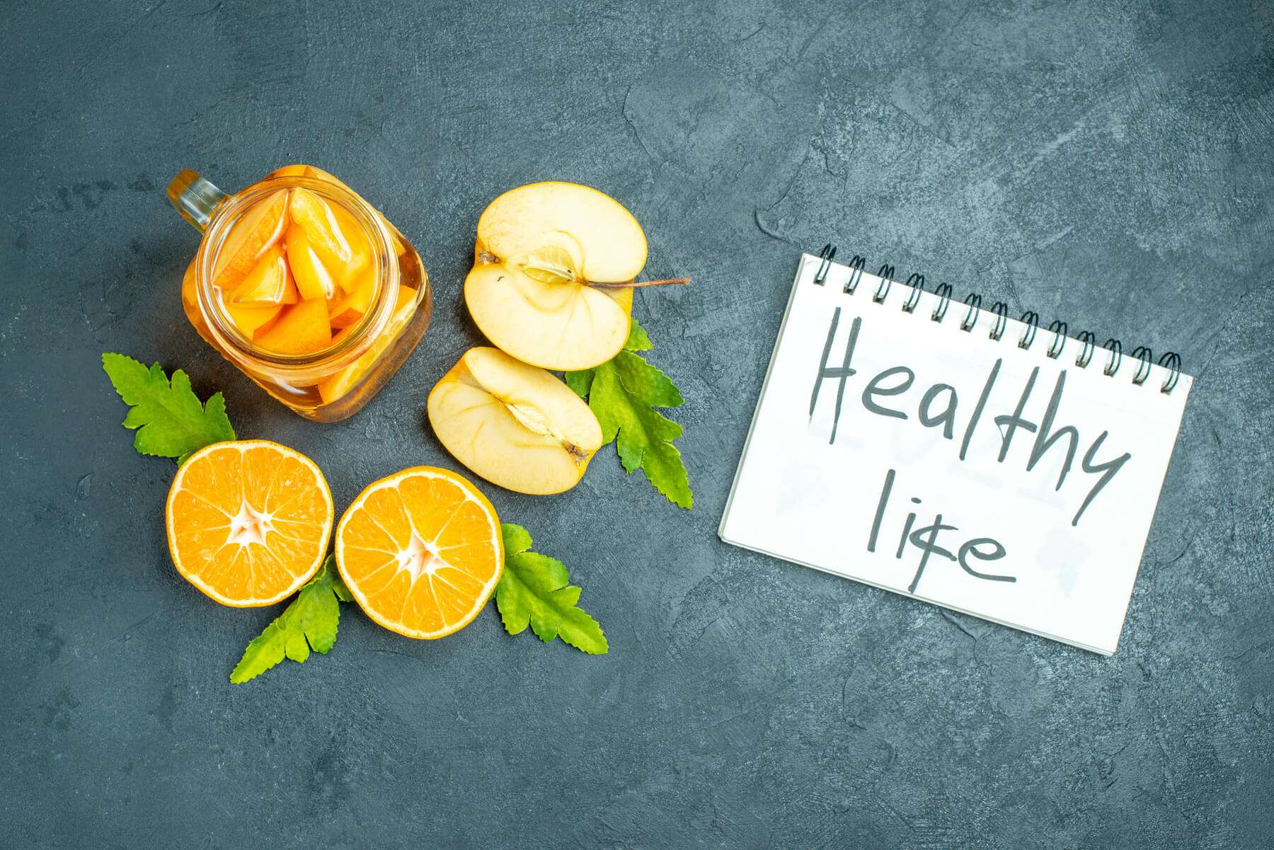 top view cocktail cut oranges and apples on dark i 2023 11 27 05 27 33 utc 1 1.jpg